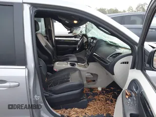2017 Dodge Grand Caravan SXT with VIN 2C4RDGCG9HR677157, listed as a IAAI auction lot 41470342 with 66,611 mi miles and . Bid and sale history available at DreamBid. Image 5.