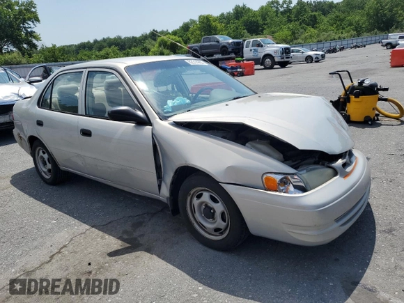 1999 Toyota Corolla VE z VIN 2T1BR12E3XC107587, wystawiony jako Copart lot #62314265 z przebiegiem 143 734 mil mil oraz Szkoda całkowita • Salvage title. Historia ofert i sprzedaży dostępna na DreamBid. Obrazek 4.