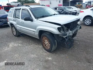 2004 Jeep Grand Cherokee Limited with VIN 1J4GX58S44C112764, listed as a IAAI auction lot 42764291 with 220,096 mi miles and . Bid and sale history available at DreamBid. Image 1.