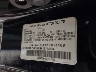 2004 Nissan 350Z Touring with VIN JN1AZ36AX4T014409, listed as a IAAI auction lot 41610945 with 86,756 mi miles. Bid and sale history available at carsss.com. Image 9.