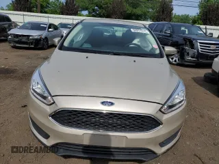 2017 Ford Focus SE z VIN 1FADP3F24HL291870, wystawiony jako Copart lot #60851275 z przebiegiem 83 334 mil mil oraz Szkoda całkowita • Salvage title. Historia ofert i sprzedaży dostępna na DreamBid. Obrazek 5.