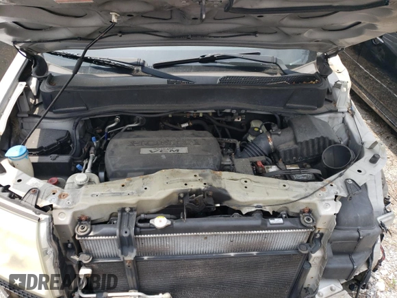 2009 Honda Pilot LX with VIN 5FNYF48259B040040, listed as a Copart auction lot 59860445 with 213,459 mi miles and Salvage title. Bid and sale history available at DreamBid. Image 12.