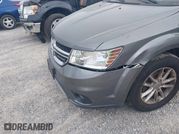 2013 Dodge Journey SXT with VIN 3C4PDCBG7DT568284, listed as a IAAI auction lot 42508928 with 215,803 mi miles and . Bid and sale history available at DreamBid. Image 6.