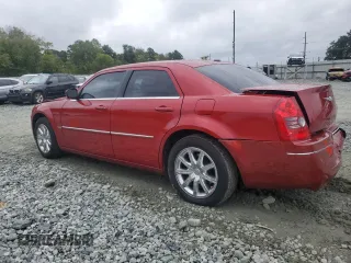 2009 Chrysler 300 Touring with VIN 2C3KA53V99H617274, listed as a Copart auction lot 71791144 with 123,045 mi miles and Salvage Title. Bid and sale history available at carsss.com. Image 2.