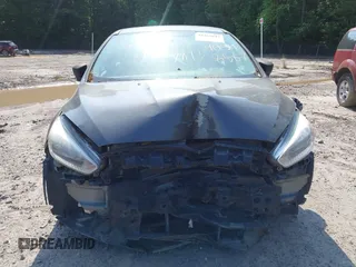 2018 Ford Focus S with VIN 1FADP3E29JL215097, listed as a IAAI auction lot 41457843 with 115,891 mi miles. Bid and sale history available at carsss.com. Image 6.