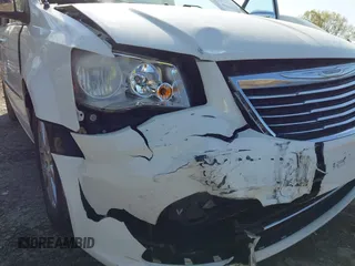 2012 Chrysler Town & Country Touring L with VIN 2C4RC1CGXCR163522, listed as a IAAI auction lot 41923296 with 218,342 mi miles and . Bid and sale history available at DreamBid. Image 14.