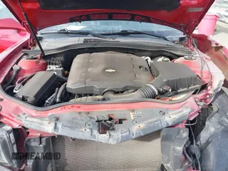 2014 Chevrolet Camaro LT z VIN 2G1FC1E31E9291298, wystawiony jako IAAI lot #41405239 z przebiegiem 122 688 mil mil oraz . Historia ofert i sprzedaży dostępna na DreamBid. Obrazek 10.