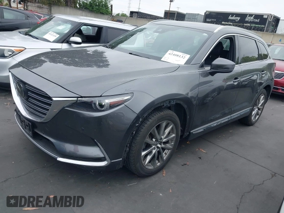 2018 Mazda CX-9 Grand Touring with VIN JM3TCBDY1J0200183, listed as a IAAI auction lot 42408132 with 69,023 mi miles and . Bid and sale history available at DreamBid. Image 2.