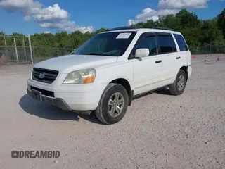 2005 Honda Pilot EX-L with VIN 5FNYF185X5B012415, listed as a IAAI auction lot 42395828 with 246,342 mi miles and . Bid and sale history available at DreamBid. Image 2.