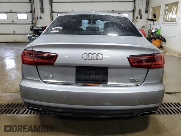 2016 Audi A6 Prestige z VIN WAUHGAFC1GN080778, wystawiony jako Copart lot #60999185 z przebiegiem 62 447 mil mil oraz Szkoda całkowita • Salvage title. Historia ofert i sprzedaży dostępna na DreamBid. Obrazek 6.