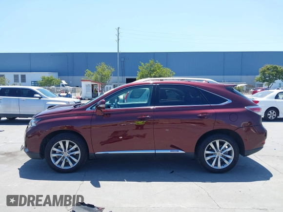 2015 Lexus RX 450h with VIN 2T2BC1BA8FC010233, listed as a IAAI auction lot 42526080 with 61,227 mi miles and . Bid and sale history available at DreamBid. Image 14.