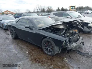 2017 Dodge Challenger R/T with VIN 2C3CDZBT1HH568931, listed as a IAAI auction lot 41474296 with 110,965 mi miles. Bid and sale history available at carsss.com. Image 1.