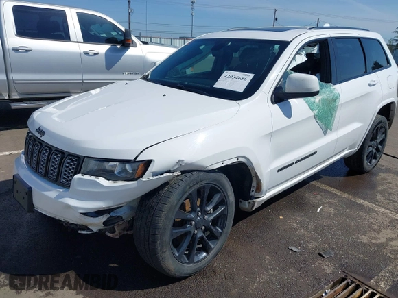 2018 Jeep Grand Cherokee Altitude with VIN 1C4RJFAG0JC296947, listed as a IAAI auction lot 42034656 with 93,979 mi miles and . Bid and sale history available at DreamBid. Image 6.