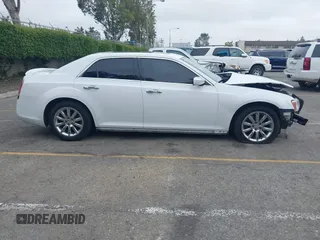 2012 Chrysler 300 C z VIN 2C3CCAET4CH236569, wystawiony jako IAAI lot #42181321 z przebiegiem 144 243 mil mil oraz . Historia ofert i sprzedaży dostępna na DreamBid. Obrazek 13.