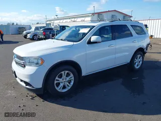 2013 Dodge Durango Crew with VIN 1C4RDJDGXDC675853, listed as a IAAI auction lot 41742767 with 101,555 mi miles. Bid and sale history available at carsss.com. Image 2.