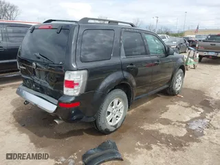 2011 Mercury Mariner with VIN 4M2CN8B7XBKJ01717, listed as a IAAI auction lot 42030587 with 115,766 mi miles. Bid and sale history available at carsss.com. Image 4.