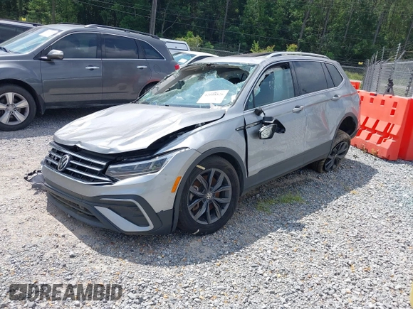 2022 Volkswagen Tiguan SE z VIN 3VV3B7AXXNM167936, wystawiony jako IAAI lot #42608826 z przebiegiem Nie podano mil oraz . Historia ofert i sprzedaży dostępna na DreamBid. Obrazek 17.