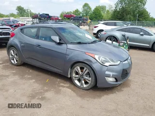 2016 Hyundai Veloster z VIN KMHTC6AD5GU302830, wystawiony jako IAAI lot #42271101 z przebiegiem 58 750 mil mil oraz . Historia ofert i sprzedaży dostępna na DreamBid. Obrazek 1.