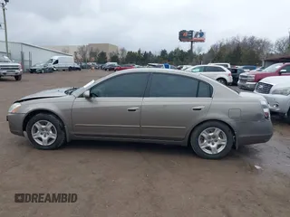 2003 Nissan Altima S z VIN 1N4AL11D53C347450, wystawiony jako IAAI lot #41523818 z przebiegiem 75 885 mil mil oraz . Historia ofert i sprzedaży dostępna na DreamBid. Obrazek 15.