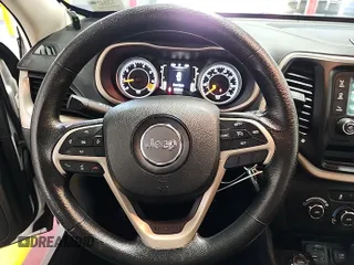 2015 Jeep Cherokee Sport with VIN 1C4PJMAB8FW685146, listed as a IAAI auction lot 42842417 with 130,325 mi miles and . Bid and sale history available at DreamBid. Image 7.