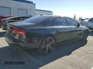 2016 Audi A8 3.0T with VIN WAU34AFD8GN009945, listed as a Copart auction lot 88804115 with 102,341 mi miles and Salvage Title. Bid and sale history available at DreamBid. Image 3.