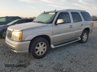 2004 Cadillac Escalade z VIN 1GYEC63T54R236225, wystawiony jako Copart lot #74075944 z przebiegiem 169 093 mil mil oraz Szkody całkowita. Historia ofert i sprzedaży dostępna na DreamBid. Obrazek 1.