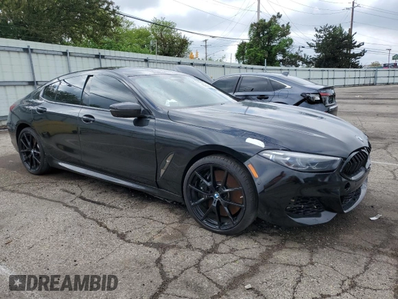 2022 BMW 8 Series M850i z VIN WBAGV8C02NCK08667, wystawiony jako Copart lot #55632805 z przebiegiem 22 737 mil mil oraz Szkody całkowita. Historia ofert i sprzedaży dostępna na DreamBid. Obrazek 4.