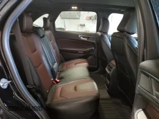 2021 Ford Edge Titanium z VIN 2FMPK4K90MBA39604, wystawiony jako Copart lot #55942265 z przebiegiem 28 117 mil mil oraz Nie do naprawy • Non repairable. Historia ofert i sprzedaży dostępna na DreamBid. Obrazek 11.