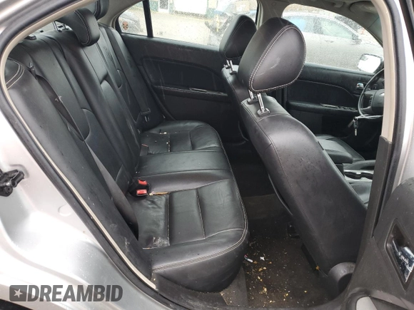 2012 Ford Fusion SEL z VIN 3FAHP0JA3CR156338, wystawiony jako Copart lot #51996885 z przebiegiem 162 892 mil mil oraz Szkoda całkowita • Salvage title. Historia ofert i sprzedaży dostępna na DreamBid. Obrazek 10.