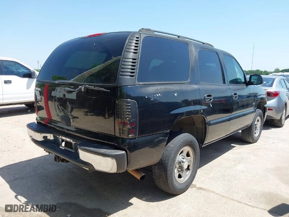 2005 Chevrolet Tahoe LS with VIN 1GNEC13VX5R180270, listed as a IAAI auction lot 42004969 with 164,258 mi miles. Bid and sale history available at carsss.com. Image 4.
