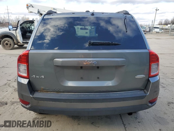 2013 Jeep Compass Latitude with VIN 1C4NJDEB0DD261731, listed as a Copart auction lot 48151495 with 189,985 mi miles and Clean Title. Bid and sale history available at carsss.com. Image 6.