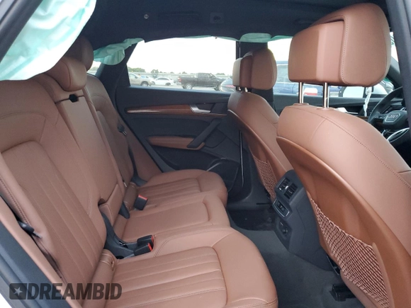 2023 Audi Q5 S line Premium Plus z VIN WA1EAAFY4P2035574, wystawiony jako Copart lot #55351055 z przebiegiem 19 777 mil mil oraz Szkoda całkowita • Salvage title. Historia ofert i sprzedaży dostępna na DreamBid. Obrazek 11.