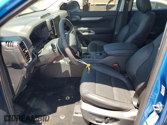 2025 Ford Ranger Lariat with VIN 1FTER4KH9SLE17446, listed as a Copart auction lot 61853775 with 1,810 mi miles and Salvage title. Bid and sale history available at DreamBid. Image 7.