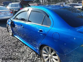 2011 Mitsubishi Lancer ES with VIN JA32U2FU8BU042901, listed as a IAAI auction lot 41450601 with 161,129 mi miles. Bid and sale history available at carsss.com. Image 14.
