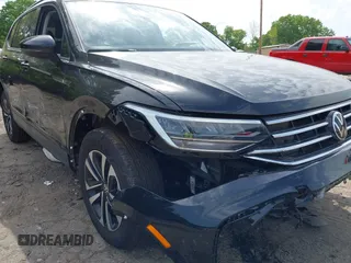 2023 Volkswagen Tiguan S with VIN 3VVRB7AX6PM108735, listed as a IAAI auction lot 42108217 with 13,279 mi miles and . Bid and sale history available at DreamBid. Image 21.