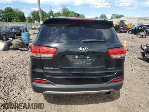 2017 Kia Sorento EX with VIN 5XYPHDA55HG201570, listed as a Copart auction lot 57595985 with 129,698 mi miles and Salvage title. Bid and sale history available at DreamBid. Image 6.