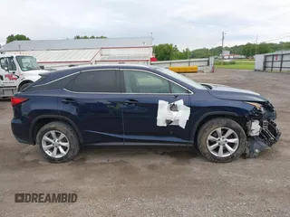 2016 Lexus RX 350 with VIN 2T2BZMCA1GC012079, listed as a IAAI auction lot 42265304 with 124,861 mi miles and . Bid and sale history available at DreamBid. Image 13.