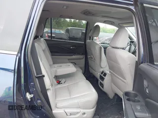 2017 Honda Pilot Touring with VIN 5FNYF6H99HB093136, listed as a IAAI auction lot 42507326 with 125,579 mi miles and . Bid and sale history available at DreamBid. Image 8.