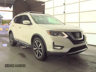 2017 Nissan Rogue SL z VIN 5N1AT2MV4HC801520, wystawiony jako Copart lot #61310595 z przebiegiem 196 062 mil mil oraz Czysty tytuł • Clean title. Historia ofert i sprzedaży dostępna na DreamBid. Obrazek 1.