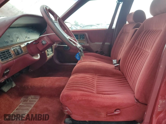 1990 Pontiac Bonneville z VIN 1G2HX54C7L1244134, wystawiony jako Copart lot #77859884 z przebiegiem 104 905 mil mil oraz Czysty tytuł • Clean title. Historia ofert i sprzedaży dostępna na DreamBid. Obrazek 7.