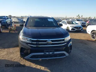 2021 Volkswagen Atlas SE with VIN 1V2WE2CA2MC221789, listed as a IAAI auction lot 41308009 with 53,627 mi miles and . Bid and sale history available at DreamBid. Image 12.