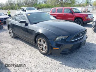 2013 Ford Mustang V6 with VIN 1ZVBP8AM7D5203672, listed as a IAAI auction lot 42104121 with 215,815 mi miles. Bid and sale history available at carsss.com. Image 1.