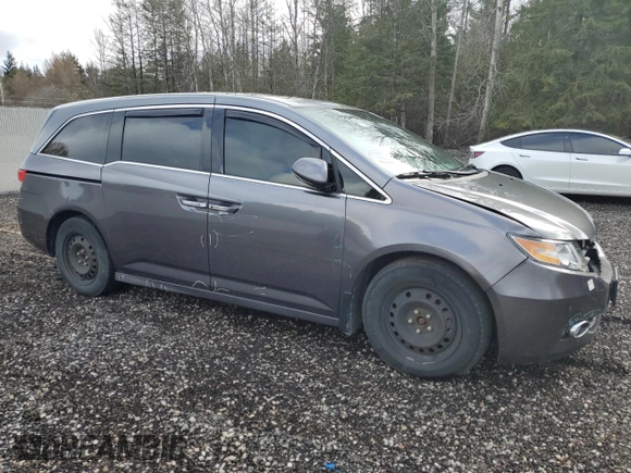 2014 Honda Odyssey Touring z VIN 5FNRL5H98EB512144, wystawiony jako Copart lot #69987533 z przebiegiem 184 231 mil mil oraz Szkoda całkowita • Salvage title. Historia ofert i sprzedaży dostępna na DreamBid. Obrazek 4.