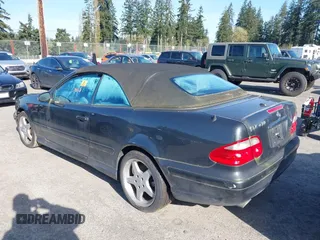 2003 Mercedes-Benz CLK 4.3L with VIN WDBLK70G13T144039, listed as a IAAI auction lot 42013311 with 121,440 mi miles. Bid and sale history available at carsss.com. Image 3.