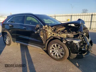 2020 Cadillac XT4 FWD Premium Luxury z VIN 1GYFZCR44LF056476, wystawiony jako Copart lot #43559495 z przebiegiem 51 076 mil mil oraz Szkody całkowita. Historia ofert i sprzedaży dostępna na DreamBid. Obrazek 4.