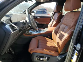 2024 BMW X7 M60i with VIN 5UX33EM08R9T81499, listed as a Copart auction lot 47220095 with 5,328 mi miles and Salvage Title. Bid and sale history available at carsss.com. Image 7.