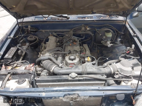 1994 Toyota Pickup z VIN JT4RN81AXR5176830, wystawiony jako IAAI lot #41924753 z przebiegiem 143 231 mil mil oraz . Historia ofert i sprzedaży dostępna na DreamBid. Obrazek 10.