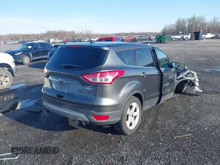 2016 Ford Escape SE with VIN 1FMCU9GX1GUB67636, listed as a IAAI auction lot 41929725 with 68,297 mi miles. Bid and sale history available at carsss.com. Image 4.