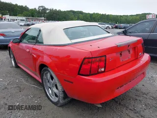 2002 Ford Mustang Deluxe z VIN 1FAFP444X2F194469, wystawiony jako IAAI lot #42358106 z przebiegiem 207 138 mil mil oraz . Historia ofert i sprzedaży dostępna na DreamBid. Obrazek 3.