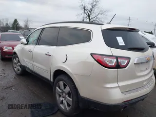 2014 Chevrolet Traverse LTZ z VIN 1GNKRJKDXEJ263349, wystawiony jako IAAI lot #41180521 z przebiegiem 141 564 mil mil oraz . Historia ofert i sprzedaży dostępna na DreamBid. Obrazek 3.